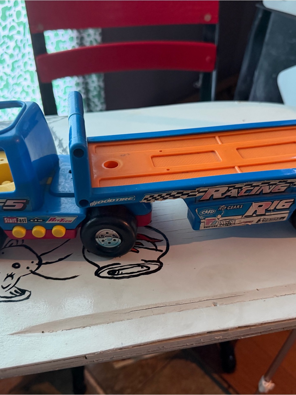 Blue and Orange Kids Racing Toy Truck will need batteries soon